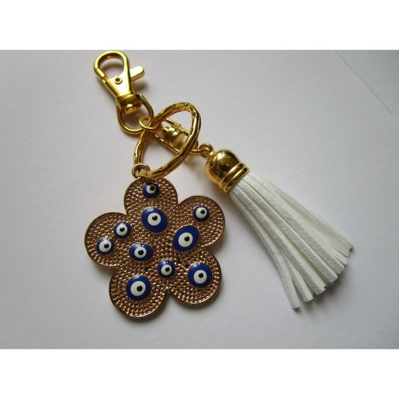 Gold tone blue evil eye flower charm key chain white leather tassel purse charm - Picture 5 of 9